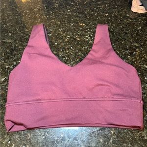 ETHOS v-neck sports bra (L) in purple/red color